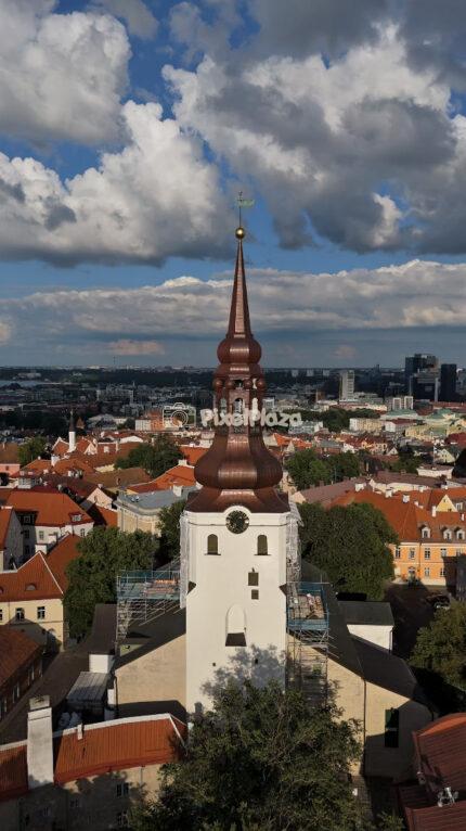 Tallinn Cathedral Bell Tower with Red Rooftops and City Skyline - Drone Video, Estonia